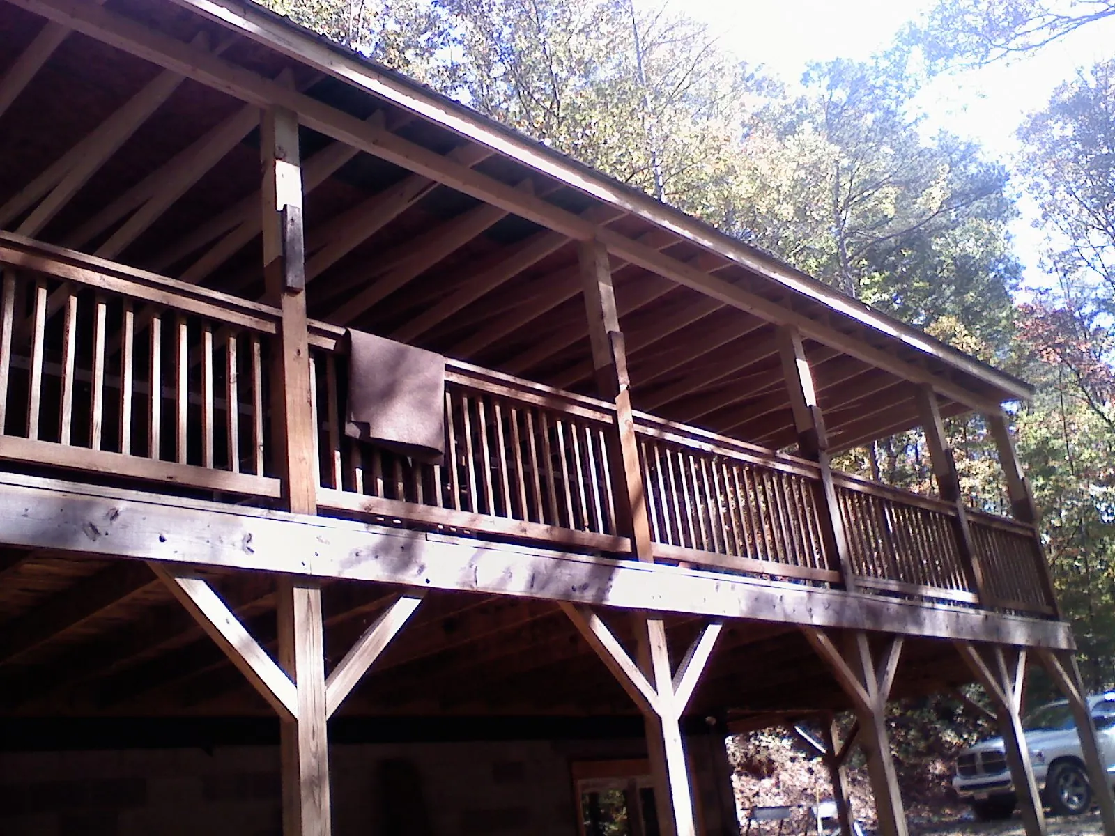 Timber framing under a new elevated porch and deck — Roof Leak Repair in Mattapoisett by Roofing Brothers